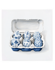Ceramic Dutch Tile featuring a six-egg carton in a Delft blue pattern.
