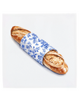 A French baguette on a Delft Blue ceramic tile without corner ornaments