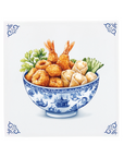 Tempura snacks on a Delft Blue ceramic tile with decorative corner ornaments