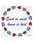 An example of a ceramic tile with Boerenbont pattern with the quote, 'East or west, home is best' in dark purple script [market:!nl,!de,!at,!fr]