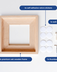 Oak wooden frame and the materials it comes with displayed on a table [market:!nl,!de,!at]