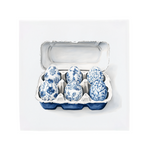 Ceramic Dutch Tile featuring a six-egg carton in a Delft blue pattern.
