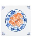 Ceramic Dutch Tile with decorative corner ornaments, featuring nigiri served on a Delft blue plate.