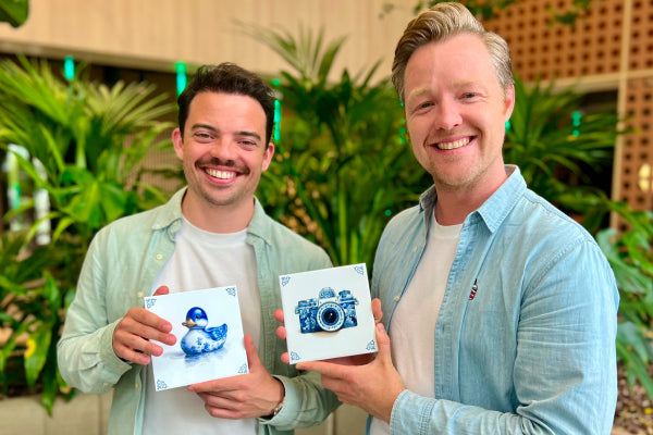 Max and Philippe, co-founders of the Dutch Tile Project, proudly holding and showing tiles