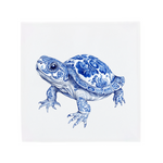 Decorative turtle with blue floral patterns on a tile on a white background