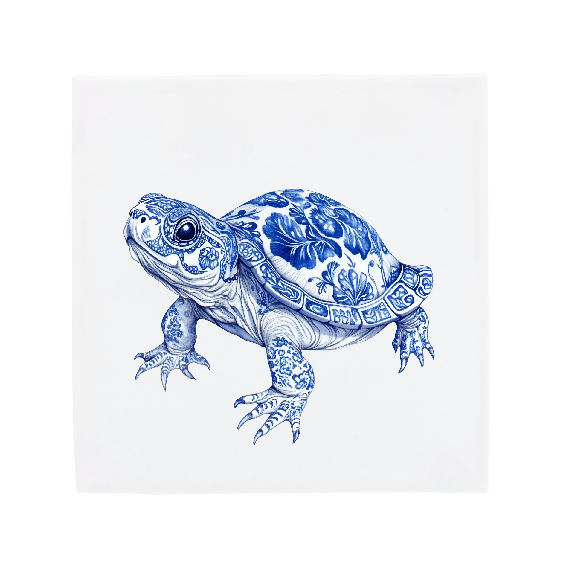 Decorative turtle with blue floral patterns on a tile on a white background