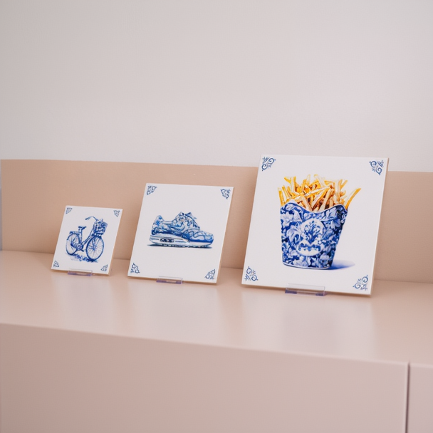 All three tile sizes on their suitable acrylic tile stands, displayed on a cabinet