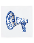 A megaphone on a Delft Blue ceramic tile without corner ornaments