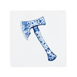 An axe on a Delft Blue ceramic tile without corner ornaments