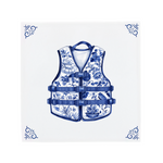 A life jacket on a Delft Blue ceramic tile with decorative corner ornaments